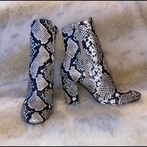 Snakeskin heel booties